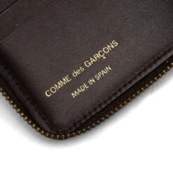 Comme Des Garcons Embossed Logo Wallet - Brown 5 Comme Des Garcons Embossed Logo Wallet - Brown -Fashion Clothing Store Comme des Garcons Embossed Logo Wallet Brown SA2100EL BRN 01 30 23 Feature VR 7