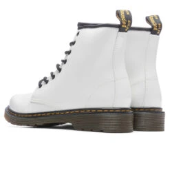 Dr. Martens Women's 1460 Patent Leather Boots - White Patent Lamper -Fashion Clothing Store Dr. Martens Youth 1460 Patent Leather Lace Up Boots Black 21979001 11 29 22 Feature JM 5
