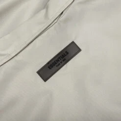 Essentials Coaches Jacket - Smoke -Fashion Clothing Store Fear Of God Essentials Coaches Jacket Smoke 202SU222011F 01 09 23 Feature VR 7