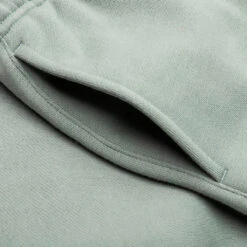 Kid's Relaxed Sweatpant - Sycamore -Fashion Clothing Store Fear Of God Essentials Kid s Relax Sweatpant Sycamore 785BT223011K 06 02 23 Feature KN 8