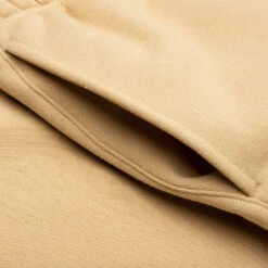 Relaxed Sweatpant - Sand -Fashion Clothing Store Fear Of God Essentials Relax Sweatpant Sand 130BT222044F 06 07 23 Feature KN 8