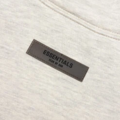 Essentials Core Relaxed Mockneck - Light Oatmeal 6 Essentials Core Relaxed Mockneck - Light Oatmeal -Fashion Clothing Store Fear of God Essentials Core Relaxed Mockneck Light Oatmeal 192BT212261F 07 25 22 Feature JM 3