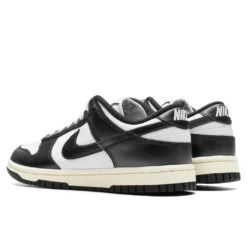 Nike Women's Dunk Low 'Vintage Panda' - White/Black/Coconut Milk -Fashion Clothing Store Nike Dunk Low PRM Women s White Black Coconut Milk FQ8899 100 10 09 23 Feature VR 4