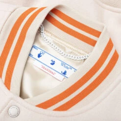 OW Patch Varsity - New Beige 9 OW Patch Varsity - New Beige -Fashion Clothing Store Off White co Virgil Abloh OW Patch Varsity New Beige OMEA305S23FAB0016120 04 06 23 S NF Feature 8