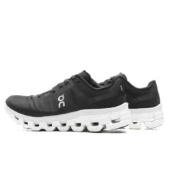 On Women's Cloudflow 4 - Black/White -Fashion Clothing Store On Women s Cloudflow 4 Black White 3WD30110299 09 27 23 Feature KN 5